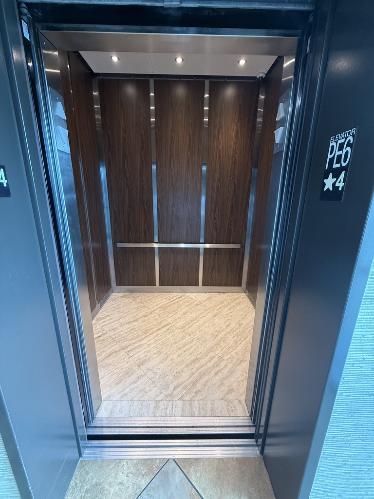 Elevator cab — architectural wrap finish review